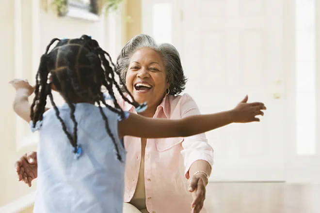 Woman with grandchild.